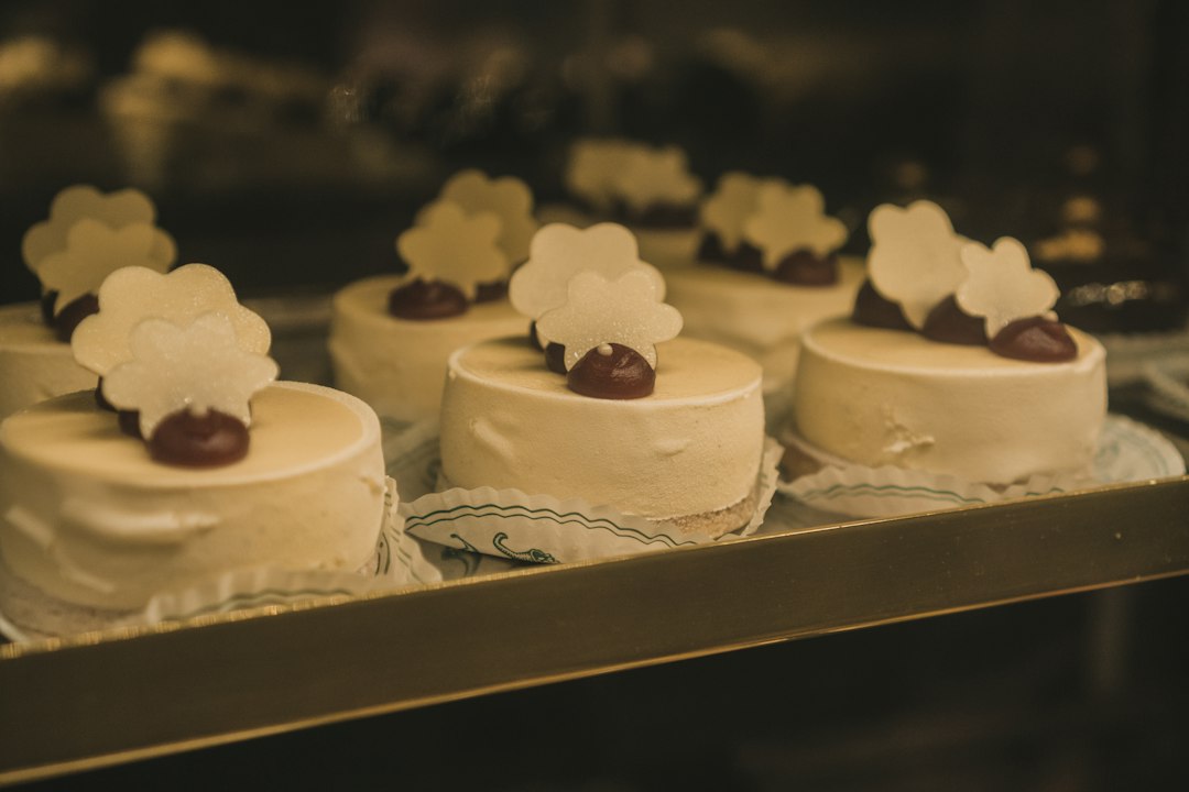 A tray of individual mini cakes