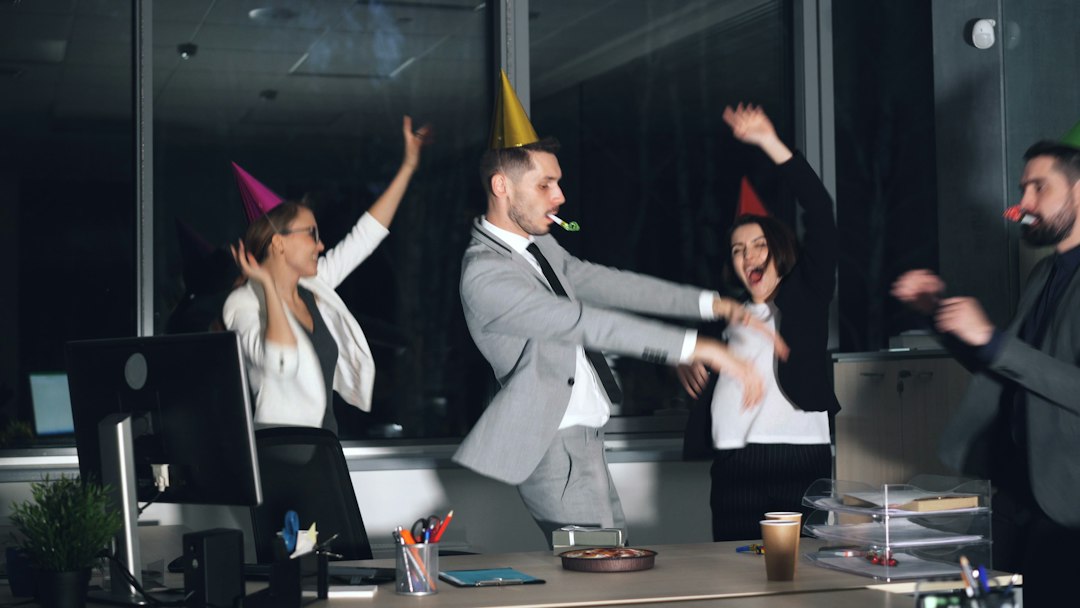 Colleagues celebrating in the office